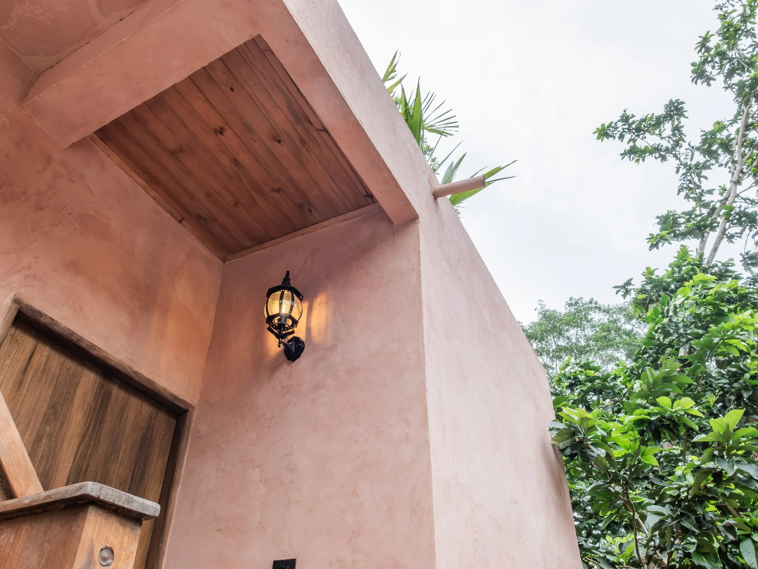 Pink façade with a lantern