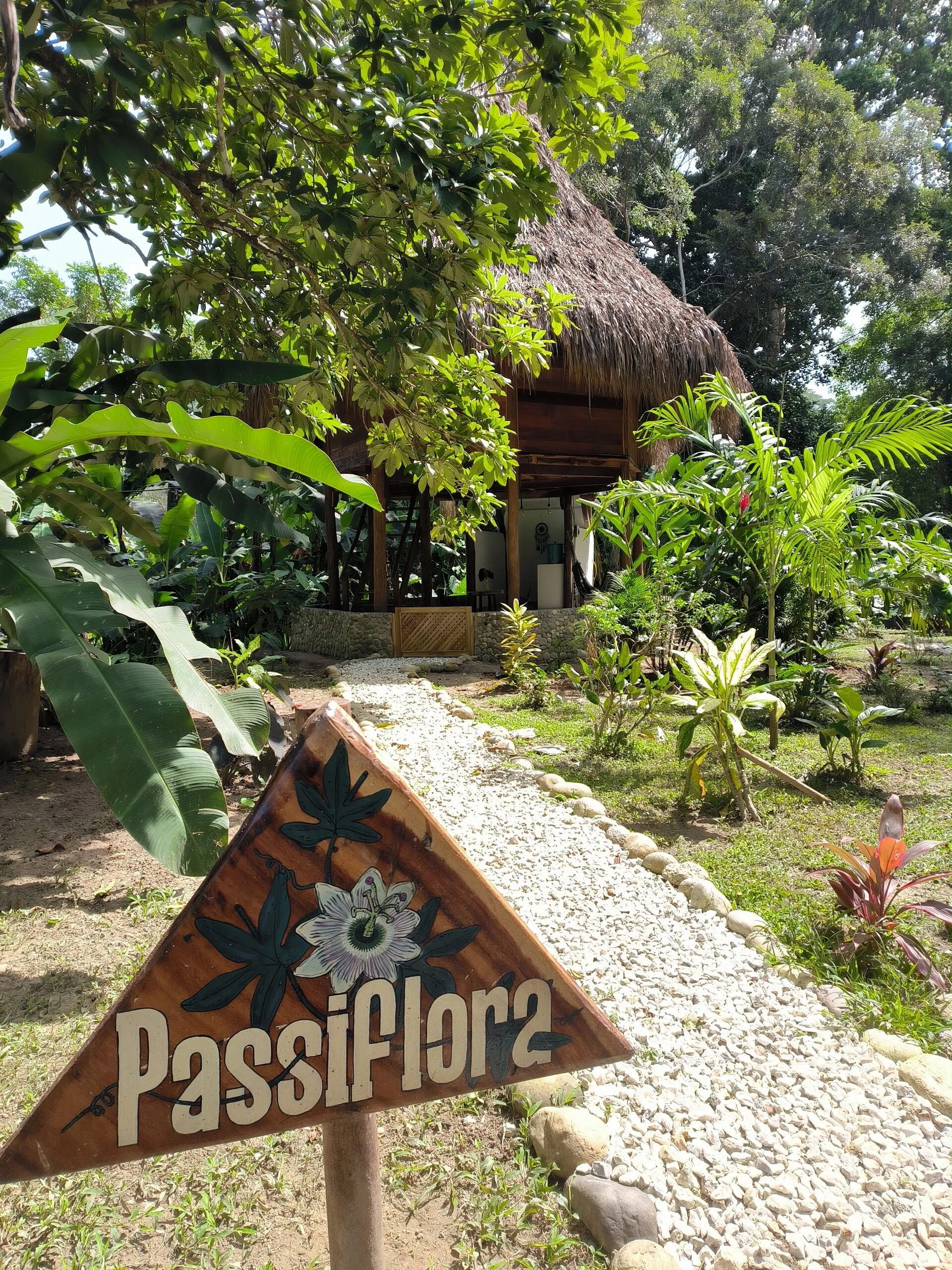 Sign and stone path to the cabin