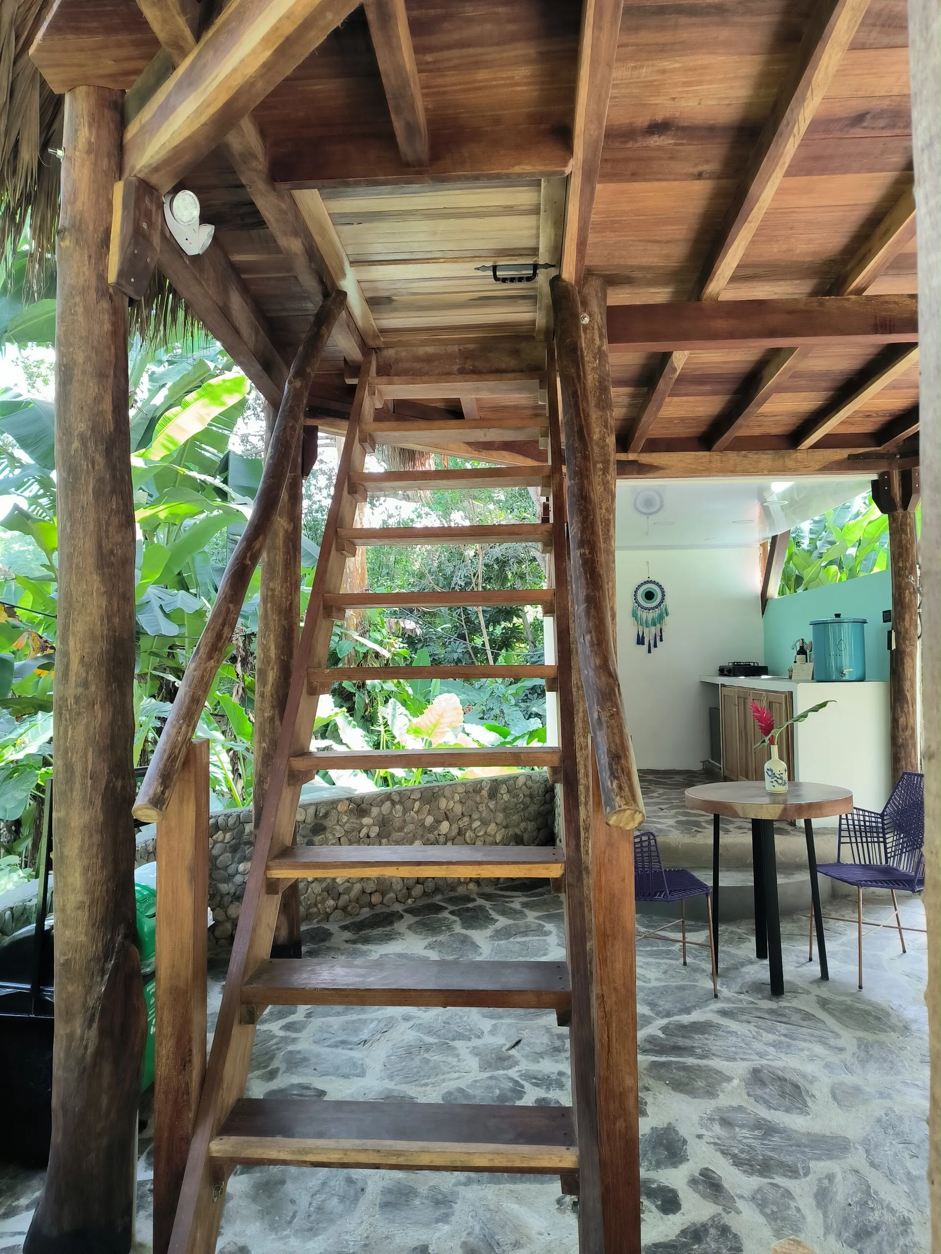Wooden ladder up to the cabin